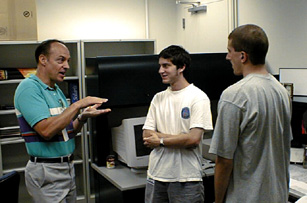 picture of Herb Frey working with Matthew and Andrew